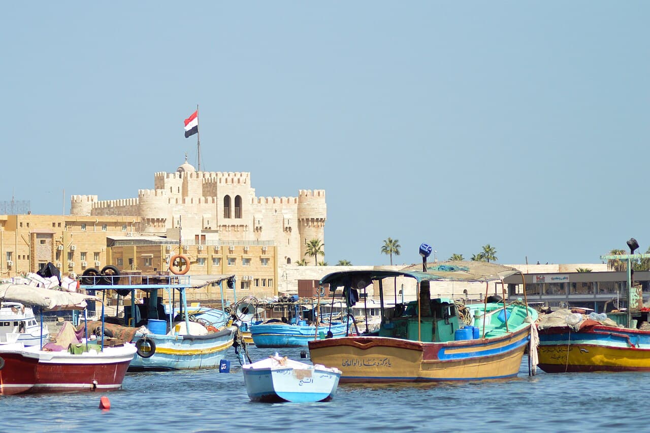 The Citadel of Qaitbay on Alexandria's harbour, with fishing boats