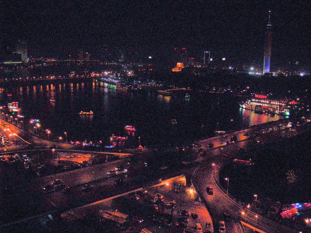 The Nile and Cairo skyline lit up at night