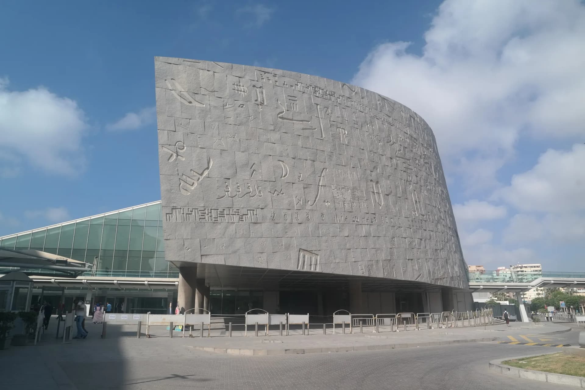 The tilted, carved granite wall of the Bibliotheca Alexandrina