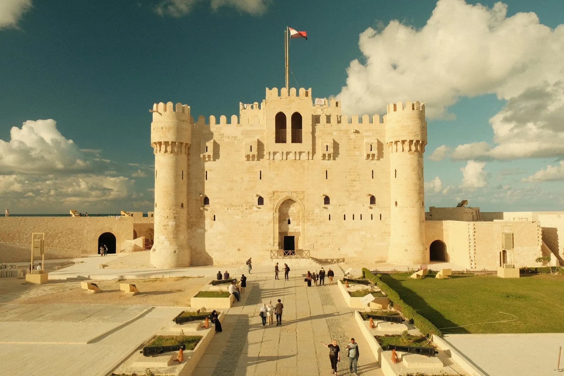 The Citadel of Qaitbay in Alexandria with its towers and flag