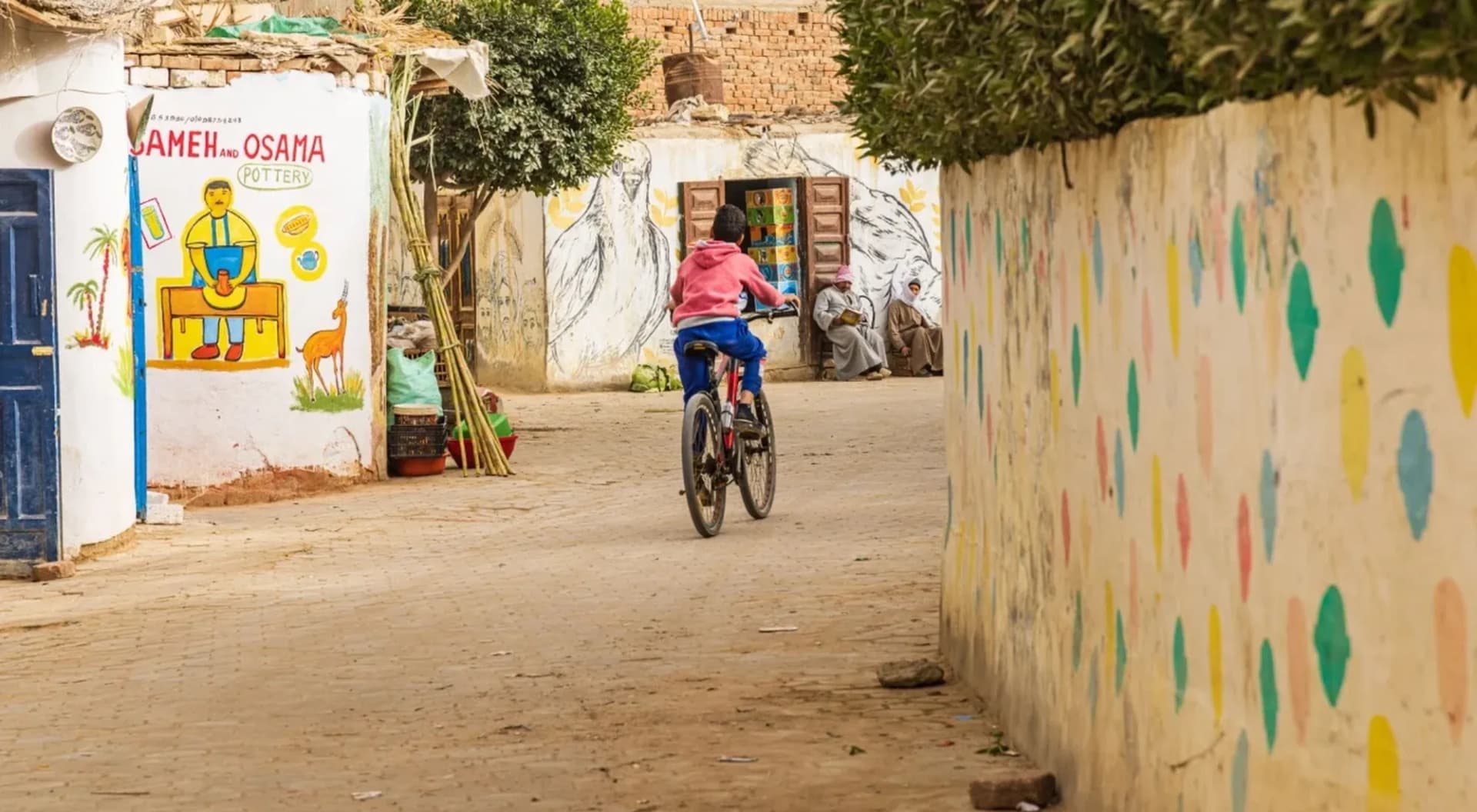 A lane with painted walls in Tunis Village, Fayoum