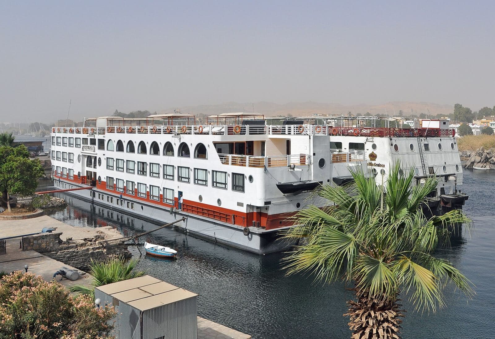 A Nile cruise ship docked on the river
